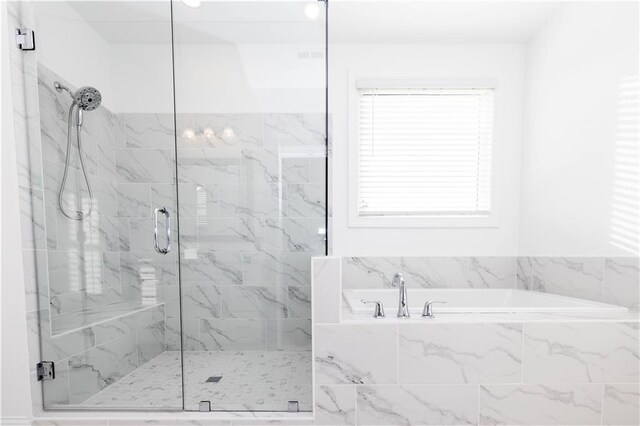 711 Dodd Ln N Unit 166, Buford, GA 30518 - full bath featuring a marble finish shower and a garden tub