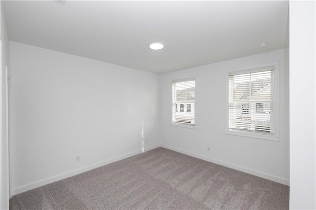 711 Dodd Ln N Unit 166, Buford, GA 30518 - unfurnished room featuring carpet flooring and baseboards