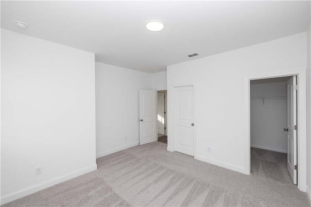 711 Dodd Ln N Unit 166, Buford, GA 30518 - unfurnished bedroom featuring carpet flooring, baseboards, and a spacious closet
