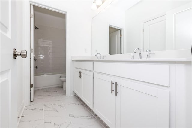 711 Dodd Ln N Unit 166, Buford, GA 30518 - full bath featuring marble look tiles, double vanity, toilet, and bathtub / shower combination