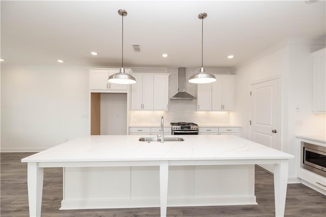 711 Dodd Ln N Unit 166, Buford, GA 30518 - kitchen featuring wall chimney range hood, a sink, stainless steel appliances, tasteful backsplash, and white cabinets