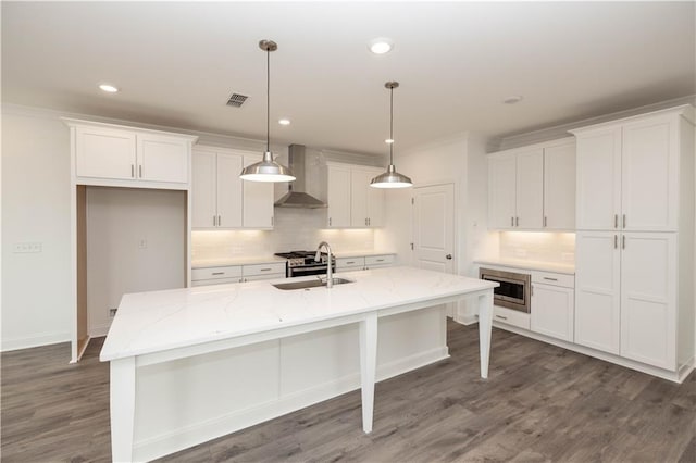 711 Dodd Ln N Unit 166, Buford, GA 30518 - kitchen featuring wall chimney range hood, white cabinetry, decorative backsplash, a sink, and recessed lighting