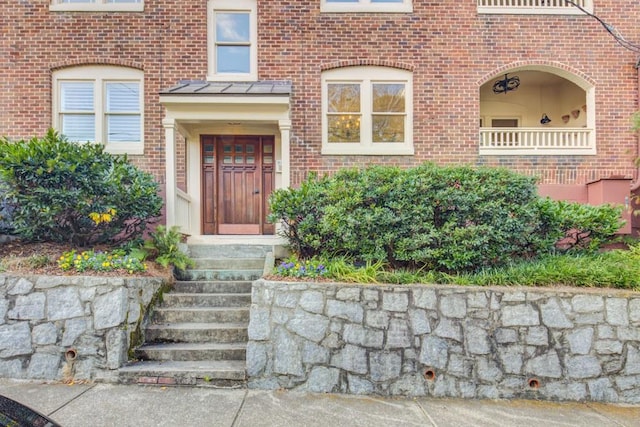 doorway to property with a balcony