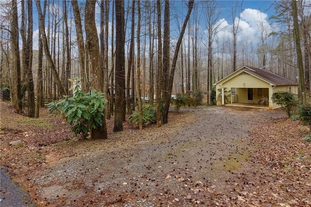 view of yard featuring a carport