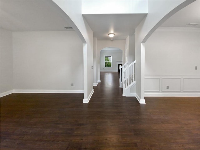 hall with dark hardwood / wood-style flooring