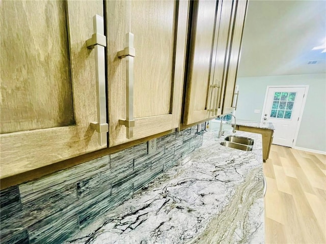 7675 Lanier View Rdg, Cumming, GA 30041 - bathroom featuring a sink, wood finished floors, and baseboards