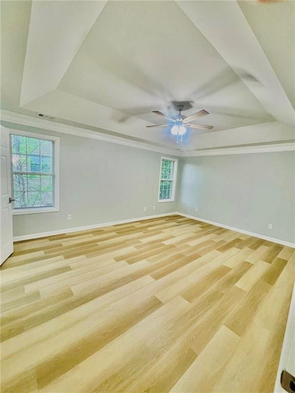 7675 Lanier View Rdg, Cumming, GA 30041 - spare room with a raised ceiling, healthy amount of natural light, ceiling fan, and baseboards