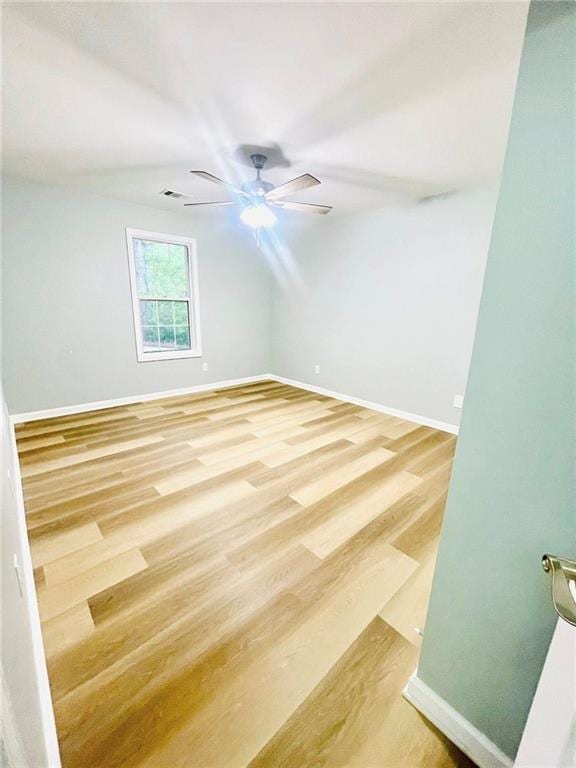 7675 Lanier View Rdg, Cumming, GA 30041 - bonus room featuring baseboards, light wood finished floors, and ceiling fan