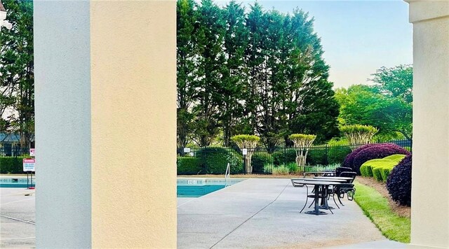 7675 Lanier View Rdg, Cumming, GA 30041 - community pool with a patio