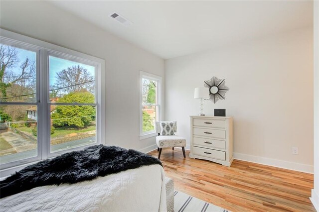 1240 Oakland Ter SW Unit B, Atlanta, GA 30310 - bedroom featuring baseboards and light wood-style flooring