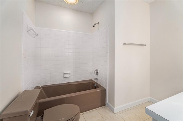 bathroom with toilet, shower / bathtub combination, baseboards, and tile patterned floors