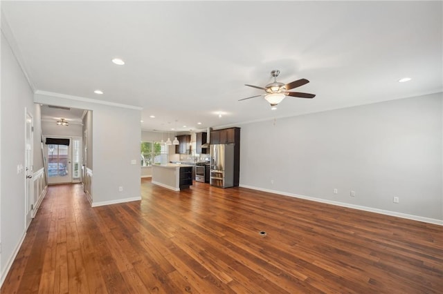 unfurnished living room featuring ornamental molding, dark wood-type flooring, and ceiling fan