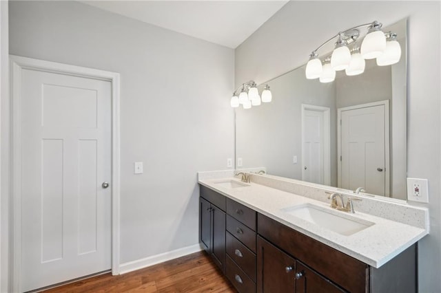 bathroom featuring vanity and hardwood / wood-style flooring