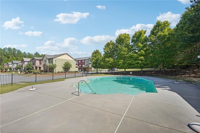 view of pool featuring a patio area