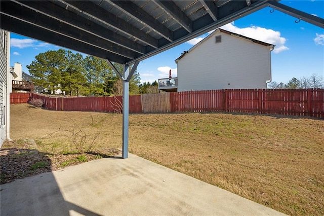 view of yard featuring a patio area and a fenced backyard