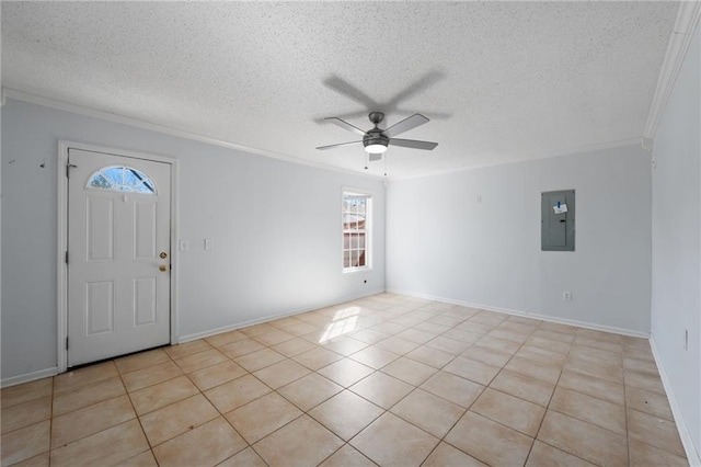 entrance foyer featuring a textured ceiling, a ceiling fan, baseboards, ornamental molding, and electric panel