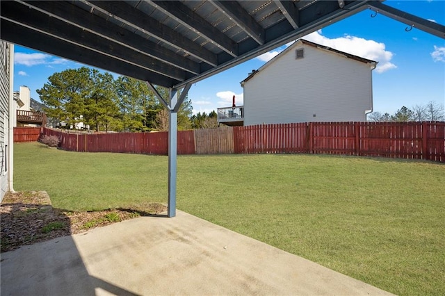 view of yard with a fenced backyard and a patio