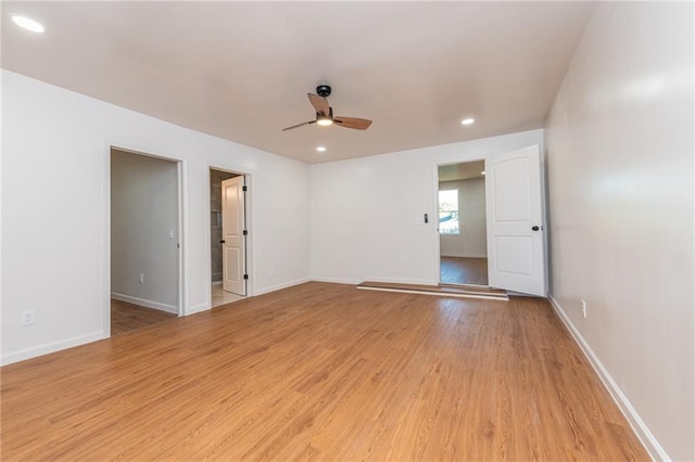 unfurnished room featuring light wood-style flooring, ceiling fan, baseboards, and recessed lighting