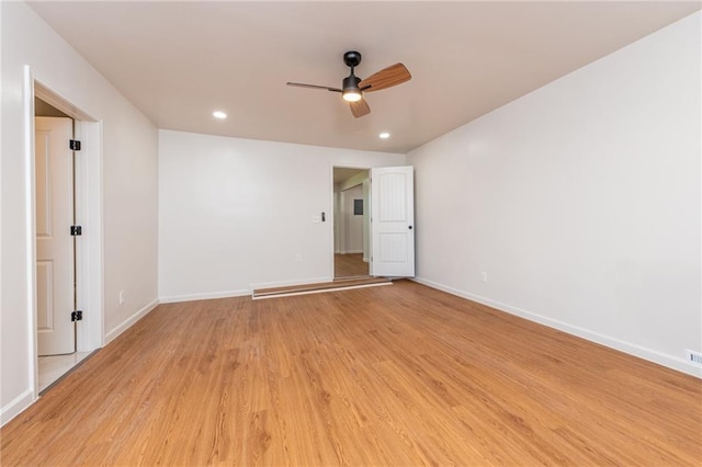 unfurnished room featuring recessed lighting, light wood-style flooring, baseboards, and ceiling fan