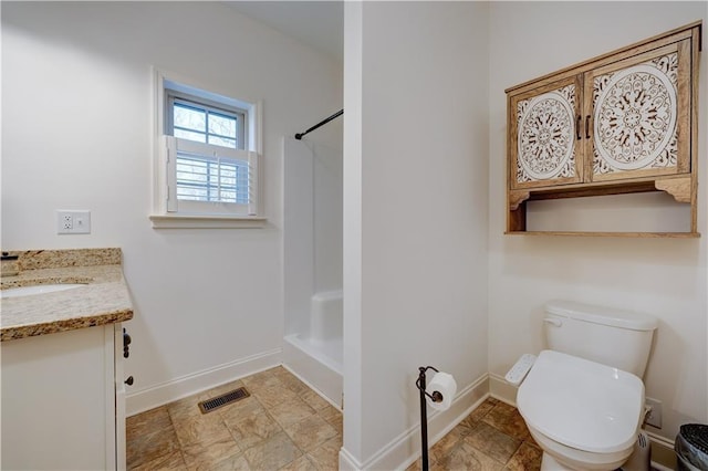 full bath featuring visible vents, toilet, vanity, baseboards, and walk in shower