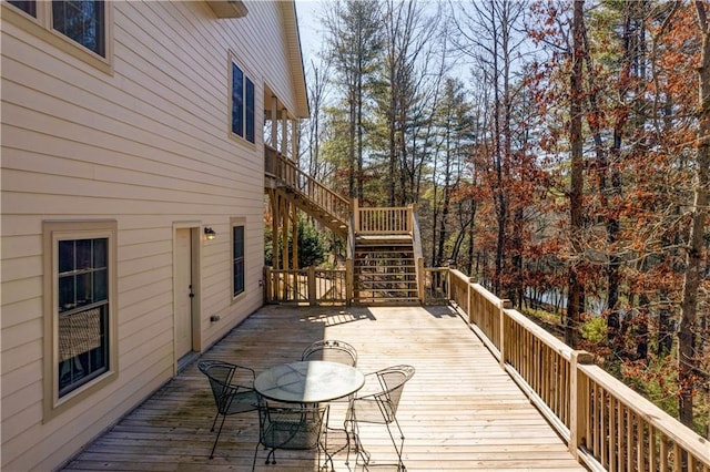 deck featuring stairway