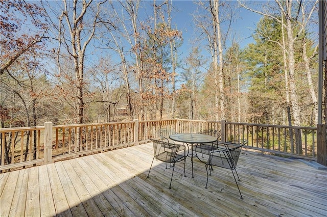 deck with outdoor dining space