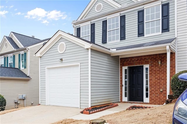 view of front property with a garage