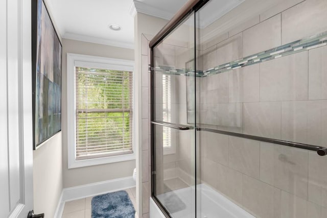 bathroom featuring toilet, bath / shower combo with glass door, tile patterned flooring, and ornamental molding