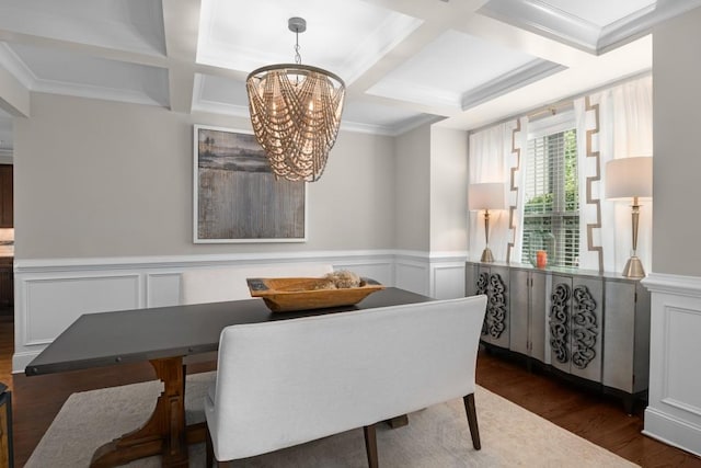 dining area with coffered ceiling, an inviting chandelier, breakfast area, and dark hardwood / wood-style floors