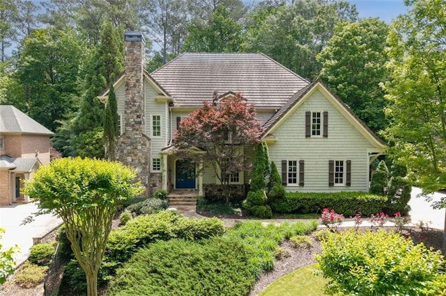view of front of home featuring a chimney