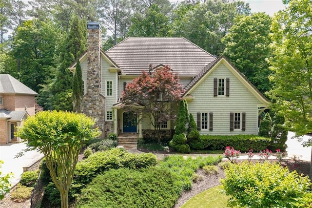 view of front facade featuring a chimney