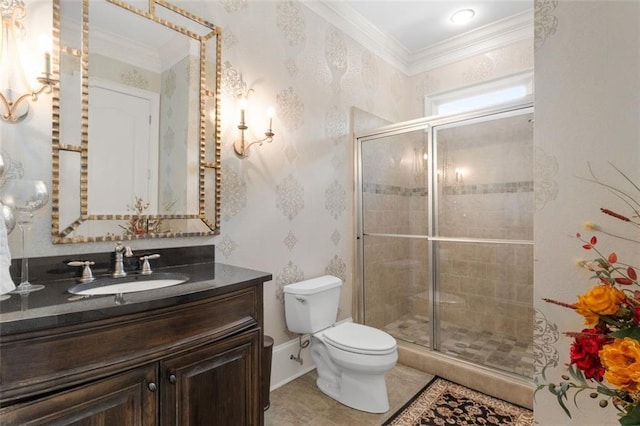 full bathroom featuring ornamental molding, a shower stall, toilet, wallpapered walls, and vanity