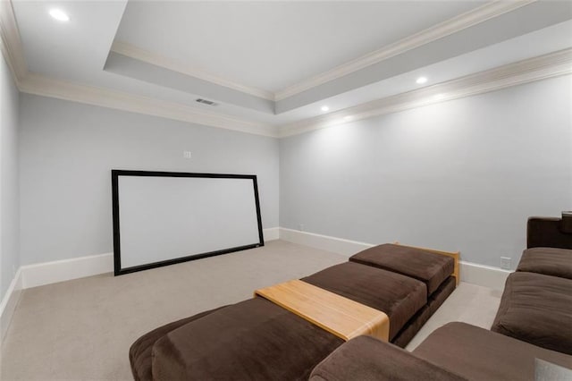 home theater featuring crown molding, light colored carpet, recessed lighting, and baseboards