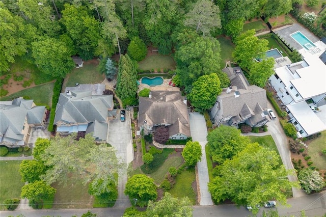 aerial perspective of suburban area with a pool area