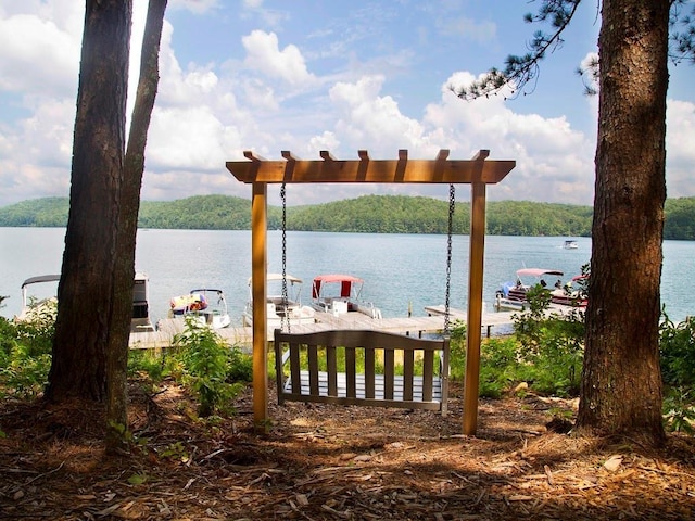 view of dock with a water view