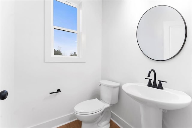 bathroom with sink and toilet