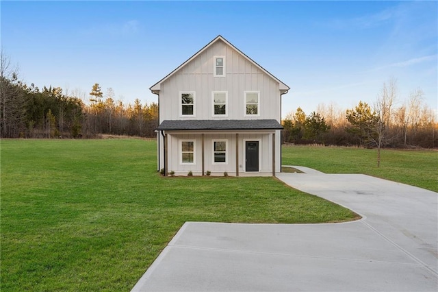 exterior space with a porch and a front yard