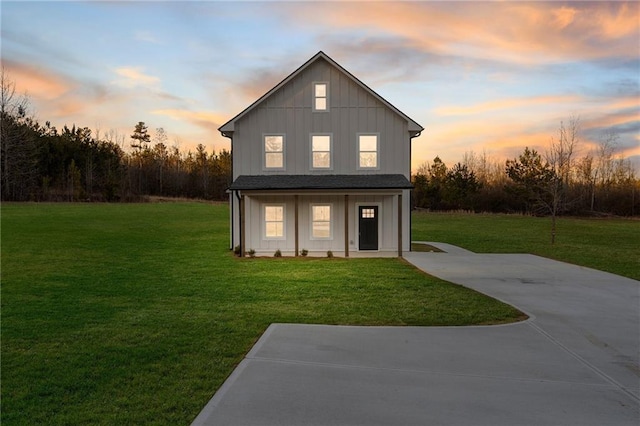 exterior space with a yard and covered porch