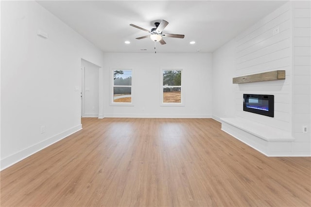 unfurnished dining area with a healthy amount of sunlight and light wood-type flooring