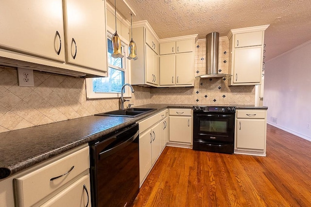 kitchen featuring sink, white cabinetry, dark hardwood / wood-style floors, black appliances, and wall chimney exhaust hood