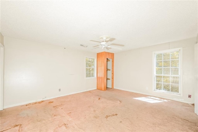 2325 E Hill Way, Norcross, GA 30071 - empty room featuring baseboards, a textured ceiling, ceiling fan, and carpet floors