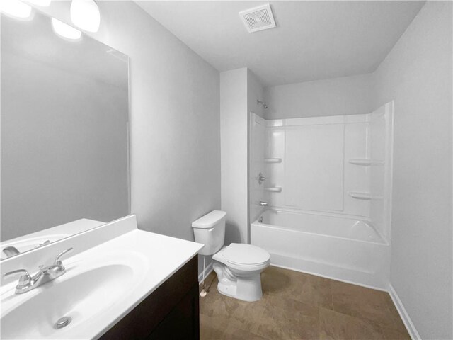 full bathroom with vanity, bathtub / shower combination, and toilet