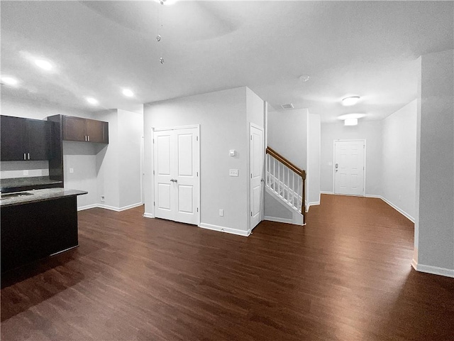 living room with dark wood-type flooring