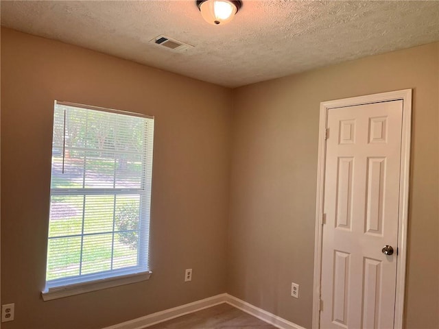 7400 Little Fawn Pkwy, Palmetto, GA 30268 - unfurnished room featuring a textured ceiling