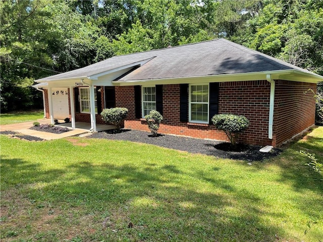 7400 Little Fawn Pkwy, Palmetto, GA 30268 - ranch-style house featuring an attached garage, brick siding, a front yard, and a shingled roof