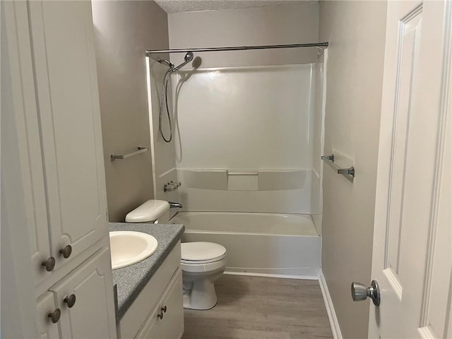 7400 Little Fawn Pkwy, Palmetto, GA 30268 - full bath with vanity, wood finished floors, bathing tub / shower combination, and a textured ceiling