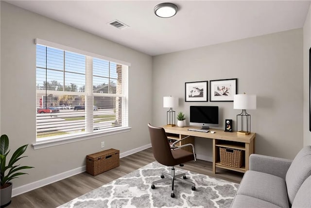 325 Nutwood Trce, Locust Grove, GA 30248 - office area with wood finished floors and baseboards