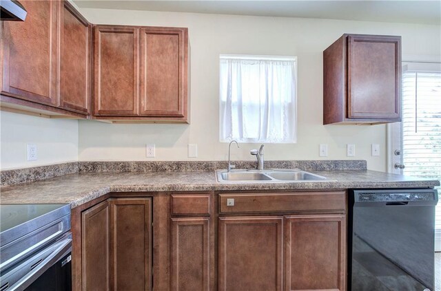 kitchen featuring a sink, black dishwasher, brown cabinets, and stainless steel electric stove