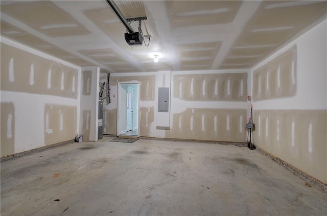 garage featuring a garage door opener and electric panel