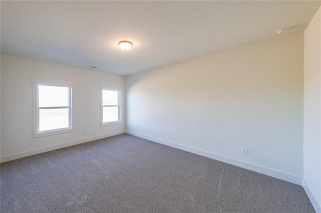 view of carpeted spare room